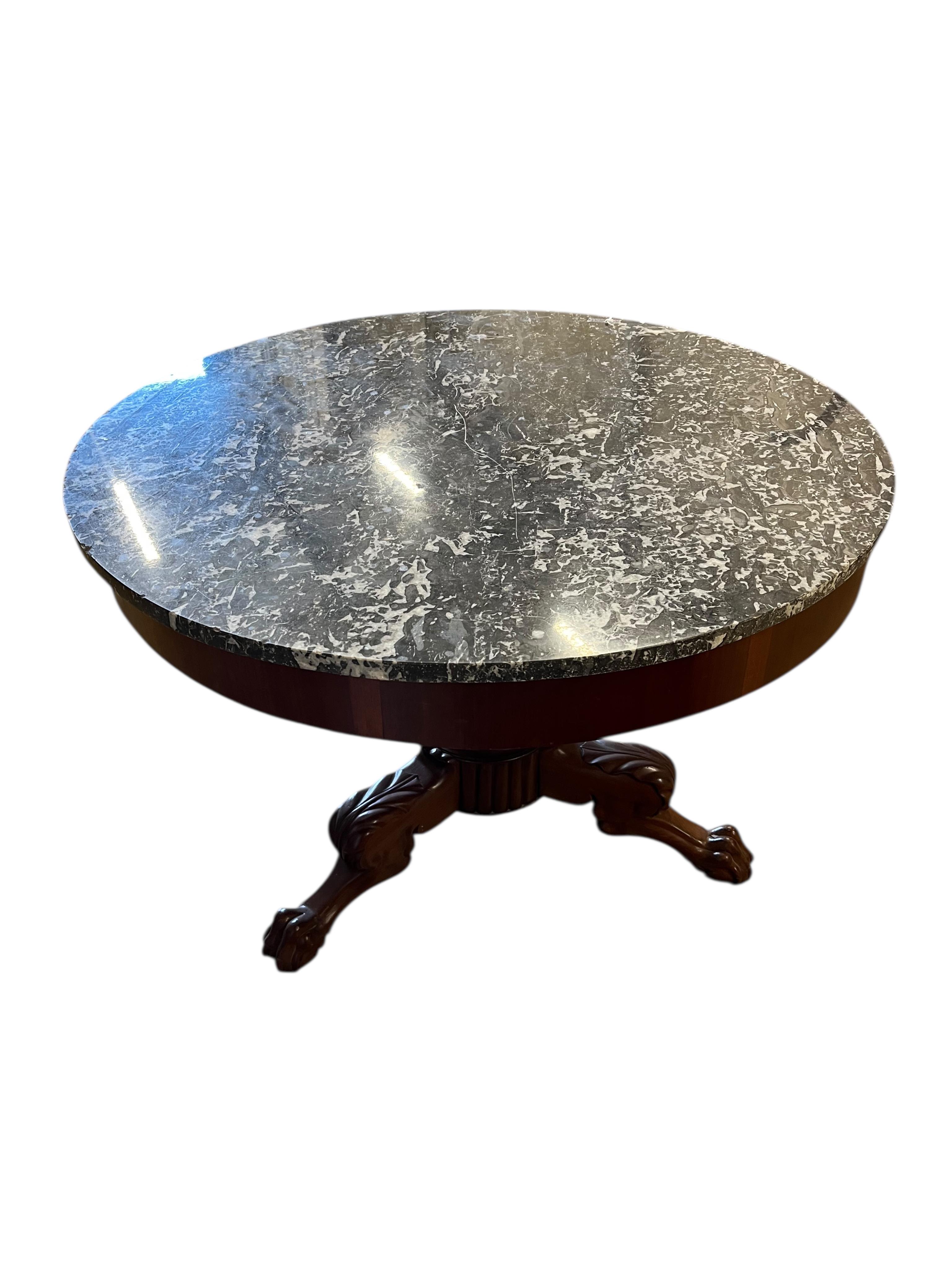 A French circular mahogany marble topped centre table, diameter 100cm, height 70cm